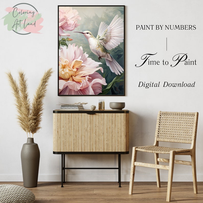 May include: A digital download paint by numbers image featuring a hummingbird in flight over a pink flower. The text "Paint by Numbers | Time to Paint | Digital Download" is displayed on a white background.