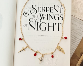 Serpent and the Wings of Night Charm Necklace: Crowns of Nyaxia Merch
