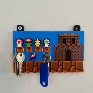 Portachiavi Super Mario con quattro ciondoli intercambiabili - Design nostalgico