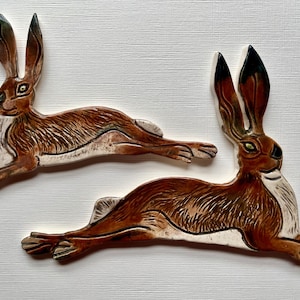 Ceramic relaxing Hare mosaic tile. Handmade and incised with surface detail making this piece a unique addition to your own mosaic project.