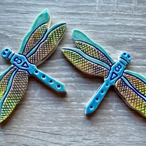 Pair of unique handmade colourful dragonfly ceramic mosaic tiles