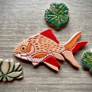 Handmade ceramic Spotty Koi mosaic tile shape, Incised and hand painted to add a unique feature to your own mosaic project.