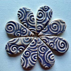 Handmade ceramic purple swirl flower mosaic tile 8 piece set,  fantastic for mosaics making and wall art projects to give a unique touch.
