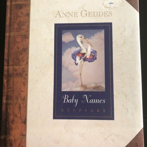 Vintage Anne Geddes baby names keepsake book hardcover. Color pictures and list of names and meanings.