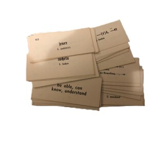 50 tarjetas antiguas de palabras aleatorias de VIS-ED en alemán. Una cara en inglés y otra en alemán. En un sobre especial.
