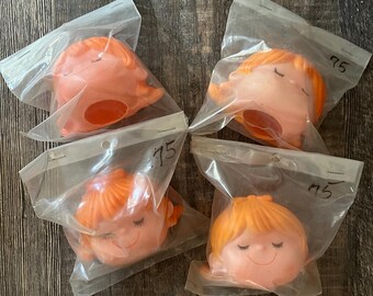 Vintage doll head. Cartoon looking face with red hair. New old stock. Approximately 2 1/2”