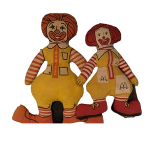 Vintage Ronald McDonald dolls one from the 70’s and one from 80’s McDonalds line.