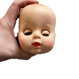 Vintage babypop hoofd gezicht.  Nieuwe oude voorraad.  Knipperende ogen. Hoofd ongeveer 4 ". ALLEEN HOOFD!