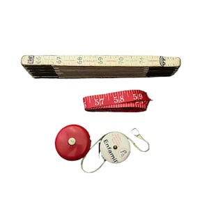 Lot of 4 vintage antique tape measures advertising.  Cloth measure, fold up wooden, red fabric measure. Stanley