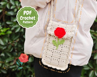 Puede incluir: Un bolso de ganchillo con fondo blanco y un diseño de rosa roja. El bolso tiene una correa y se lleva sobre el hombro. El bolso está hecho con punto de ganchillo y tiene un borde festoneado. El bolso es un patrón de ganchillo PDF.