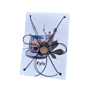 zheton.na.metro. Kiev. Rame. Gettone della metropolitana. Collana per gettone. Souvenir.