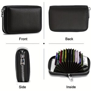 May include: Black leather zippered wallet with multiple card slots. The wallet is open to show the inside with multiple card slots and a zippered pocket.