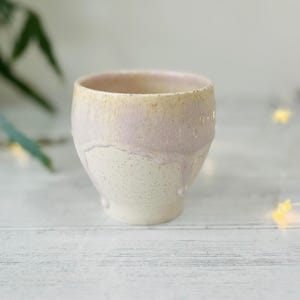 Pink drippy glaze and speckled porcelain wine cup.   Pottery wine glass.  Pottery wine goblet.  Ceramic wine glass.  Handmade wine cup.