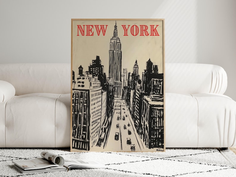 May include: A black and white illustration of the New York City skyline, featuring the Empire State Building and other skyscrapers. The image has a vintage aesthetic and includes the text "NEW YORK" in red.