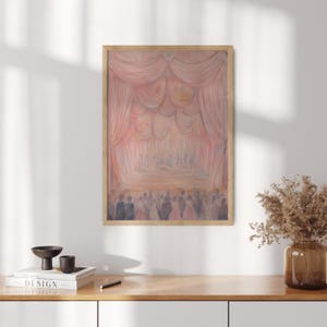 May include: A painting of a stage with pink curtains and a crowd of people in the audience. The stage is lit with a warm, soft light. The painting is framed in a simple wooden frame.