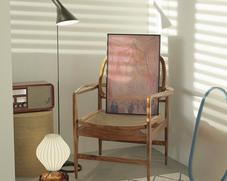 May include: A wooden chair with a woven cane back and seat, a painting of a pink and yellow stage curtain, and a white lamp with a white shade.