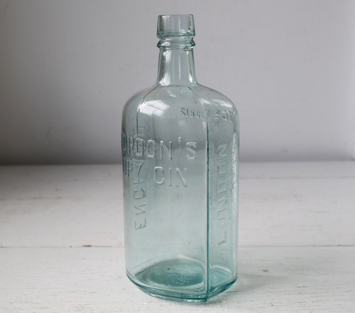 Antique liquor bottle. aqua Gordon's Dry Gin. Industrial Etsy