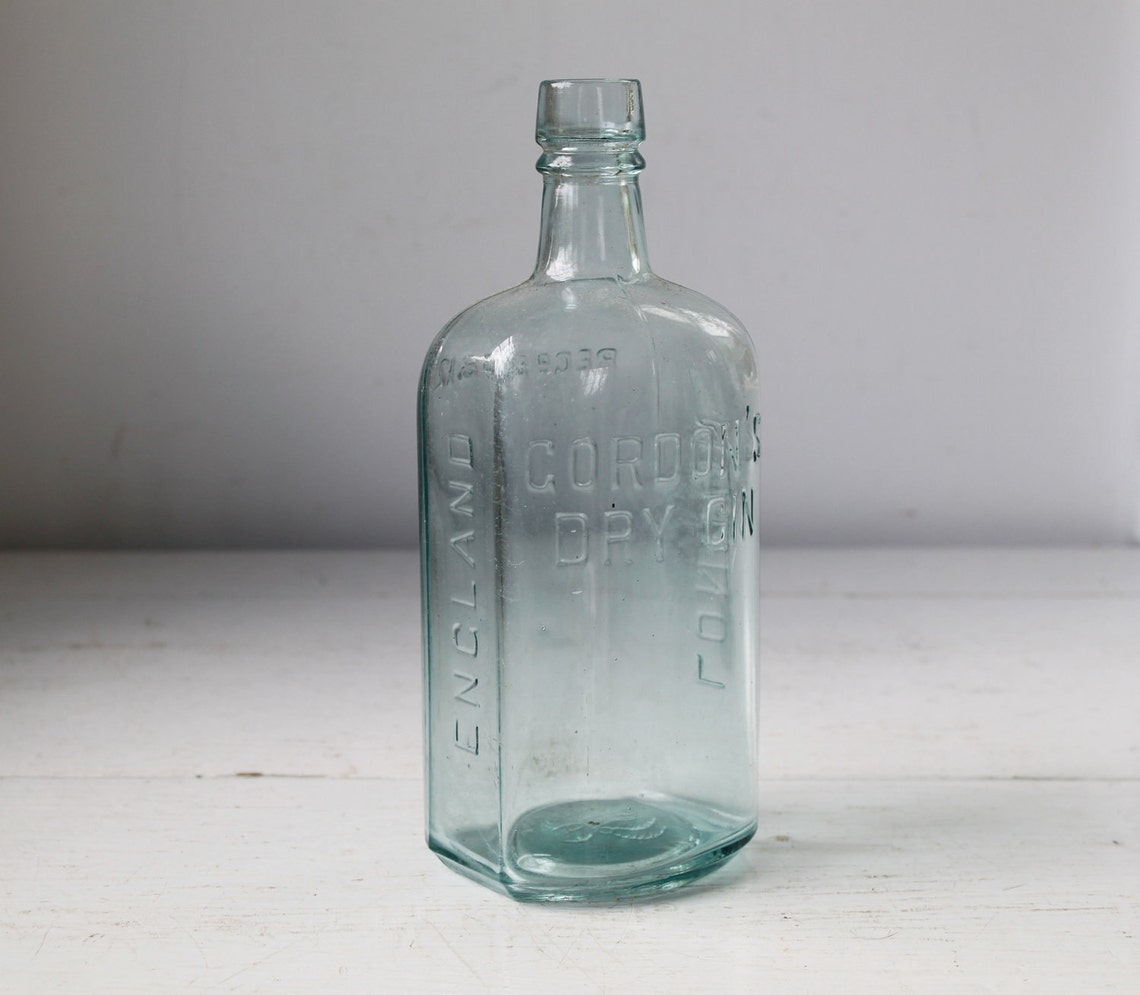 Antique liquor bottle. aqua Gordon's Dry Gin. Industrial Etsy