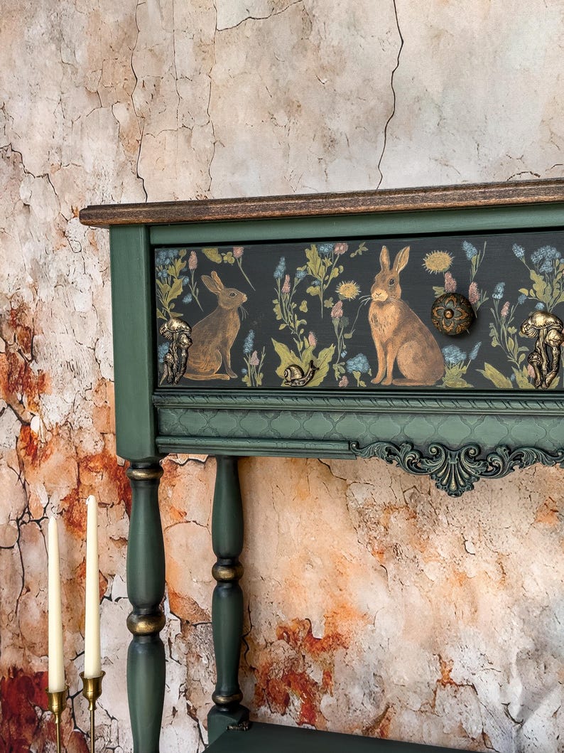Luxury green console table, hand-painted with whimsical floral and animal motif, detailed carved legs and trim, one-of-a-kind functional art furniture piece for elegant interiors