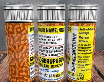 May include: A stainless steel tumbler with a design resembling a prescription pill bottle. The tumbler is filled with a graphic of beans and features text including "SOBERUPUBUM" and "Smart Pharmacy".