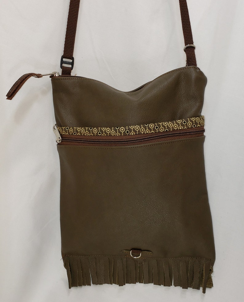 Leather Large Travel Bag that Can Convert to a Backpack Fringed Free Shipping.