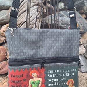 Sarcastic Graphic Tablet Bag that converts to a Backpack. 8 Exterior Pockets.  4 Zipped.  4 Open.