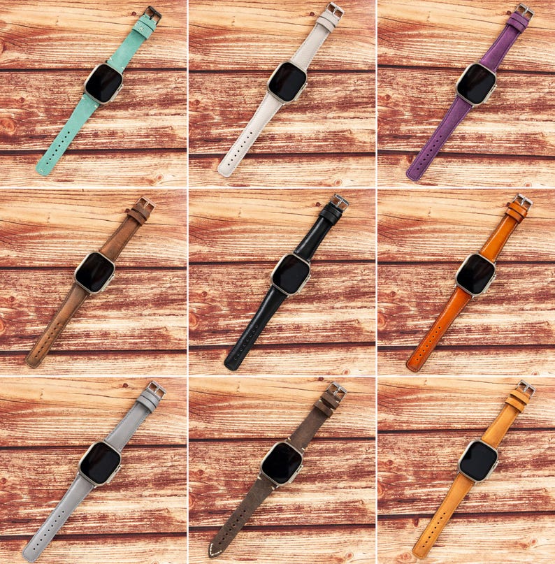 May include: Nine different colored leather watch bands for a smart watch. The bands are shown on a wooden background.