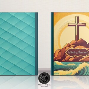 May include: A teal blue journal with a geometric pattern on the front cover. The back cover features a colorful illustration of a cross on a rocky island with waves crashing against the shore. The text "Bible Journal" is printed on the cover.