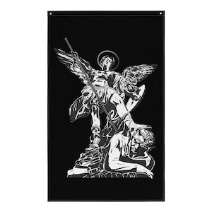 May include: Black and white flag with a detailed illustration of Saint Michael the Archangel. The artwork shows the saint with a halo, wings, and a spear, victorious over a fallen figure. The design is a striking representation of religious iconography.