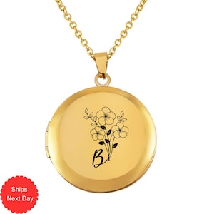 May include: Gold locket necklace with a floral design and the letter "B" engraved on the front.