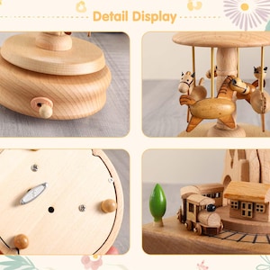 May include: A wooden carousel music box with a hand-crank winding mechanism. The carousel features a horse, a train, and a tree. The music box is made of light wood and has a natural finish.