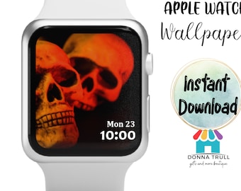 May include: An Apple Watch with a white band displays a spooky skull wallpaper in shades of orange and red. The watch face shows the date and time. Text on the right says "Apple Watch Wallpaper" and "Instant Download".