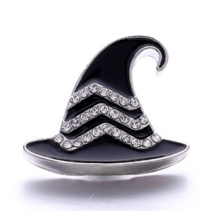 May include: A black witch hat-shaped brooch with a silver-colored trim. The hat features three chevron-shaped rows of clear, sparkling rhinestones. The brooch is a decorative accessory, perfect for Halloween or themed events.