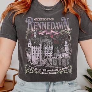 a woman sitting on a chair wearing a t - shirt