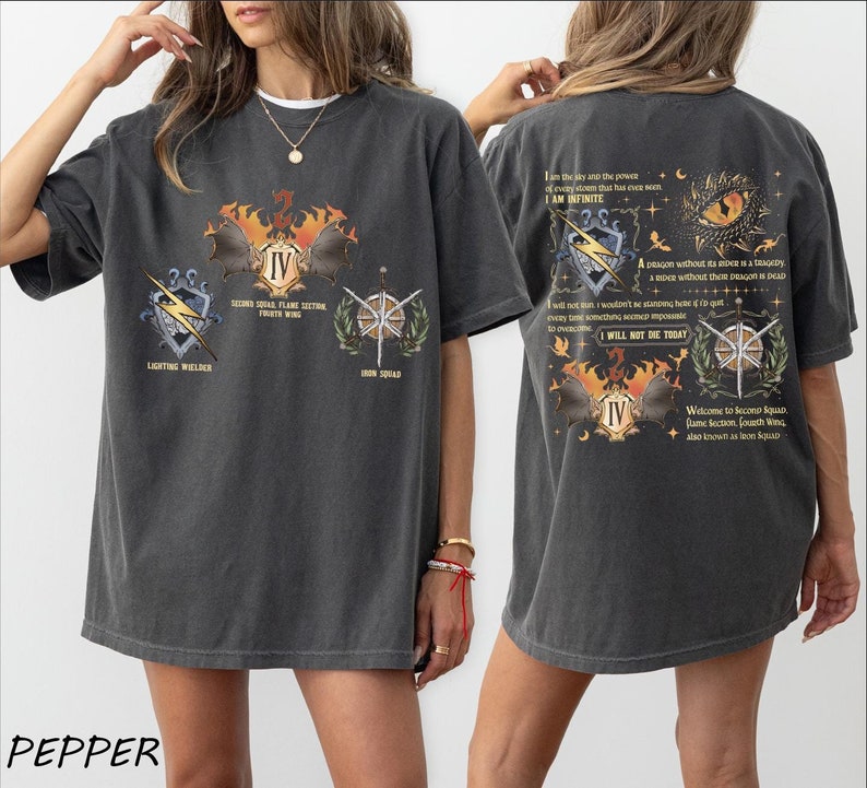 a woman wearing a black t - shirt with a picture of a butterfly on it