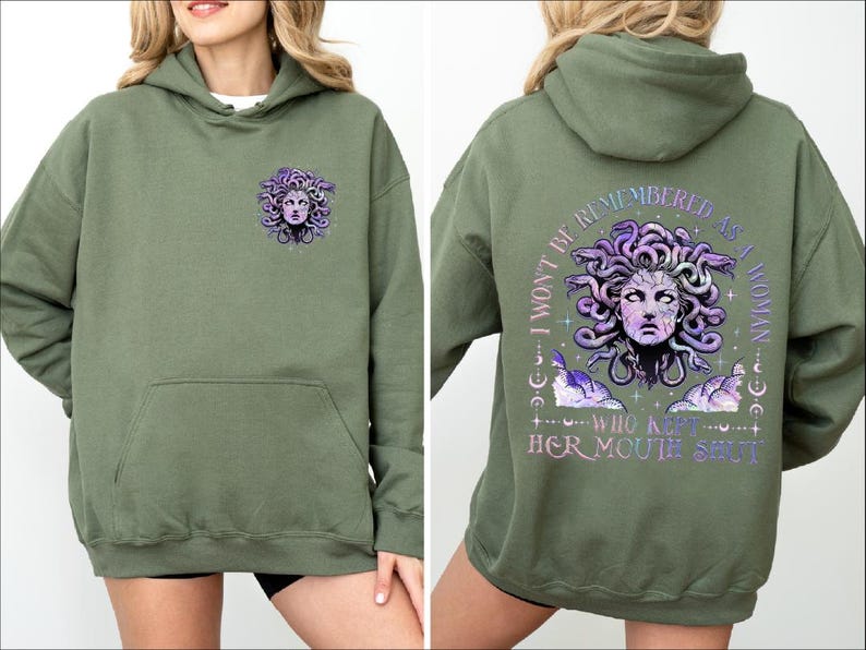 a woman wearing a green hoodie with an image of a woman's face