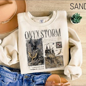 a white shirt with a picture of a dragon on it