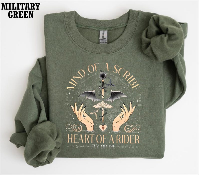 a t - shirt with a picture of a heart of a spider on it