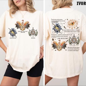 a woman wearing a white t - shirt with an image of a compass and other
