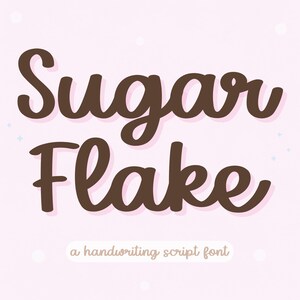 May include: The words "Sugar Flake" are written in a brown, cursive font with a light pink shadow, set against a soft pink background. Below, the text "a handwriting script font" is in a smaller, light brown font.