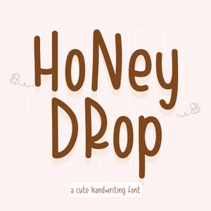 May include: Honey Drop, a cute handwriting font, is displayed in brown letters against a light pink background with a subtle honeycomb pattern. Two small bees are drawn on either side of the text.