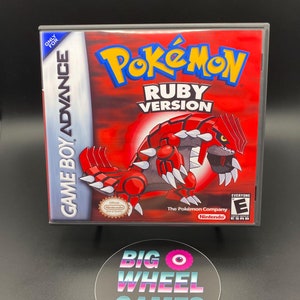 May include: A red Game Boy Advance game cartridge for Pokemon Ruby Version. The front of the cartridge features a red and black Pokemon character with the game title and rating.