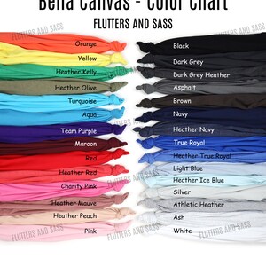 May include: Color chart showing Bella Canvas t-shirt colors.  The chart includes 20 different colors, including orange, yellow, turquoise, maroon, red, pink, black, dark grey, asphalt, brown, navy, true royal, light blue, silver, athletic heather, ash, and white.
