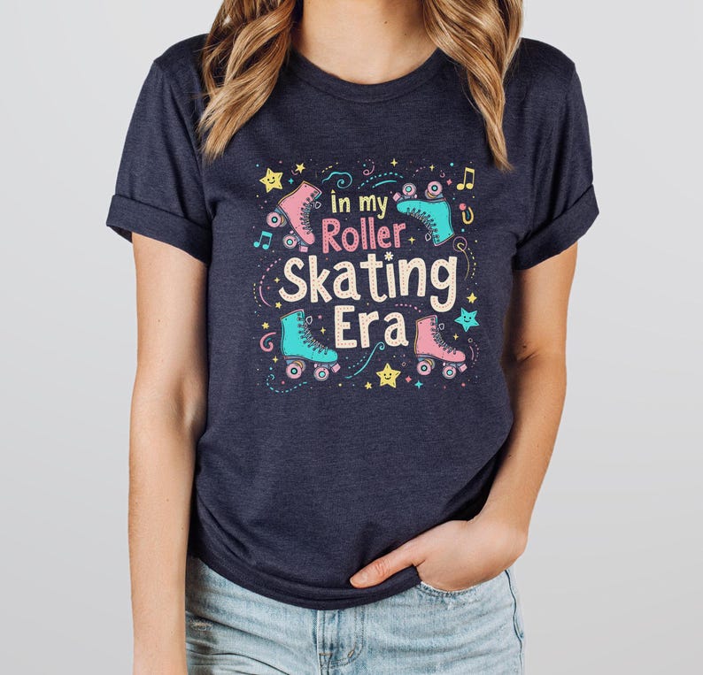 May include: A navy blue t-shirt with a graphic of roller skates and the text "in my roller skating era".