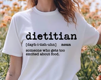 May include: White t-shirt with black text that reads "dietitian [dayh-i-tish-uhn] noun someone who gets too excited about food."