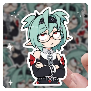 May include: A die-cut vinyl sticker featuring an anime-style character with mint green hair, red eyes, and round glasses. The character wears a black outfit with a white collar, a heart-shaped pendant with the text RIP, and spiked arm cuffs.