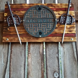 TMNT Raphael&#39;s Sai set manhole wall mount
