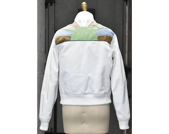 Jaqueta vintage ROXY de veludo cotelê dos anos 80 com aplique de raio de sol nas costas e forro acolchoado verde.