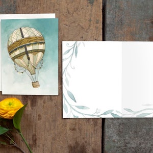Carte « Toute occasion » en montgolfière - Carte vierge ou d'anniversaire - Papeterie illustrée à l'aquarelle - Oeuvre d'art par Alicia's Infinity