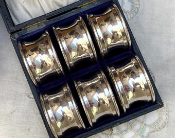 A Set Of Six Antique Sterling Silver Napkin Rings In A Box